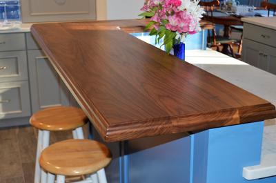 Black walnut bar top adds warmth and sophistication